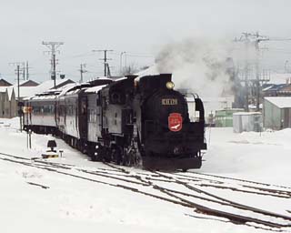 �~�̎������P